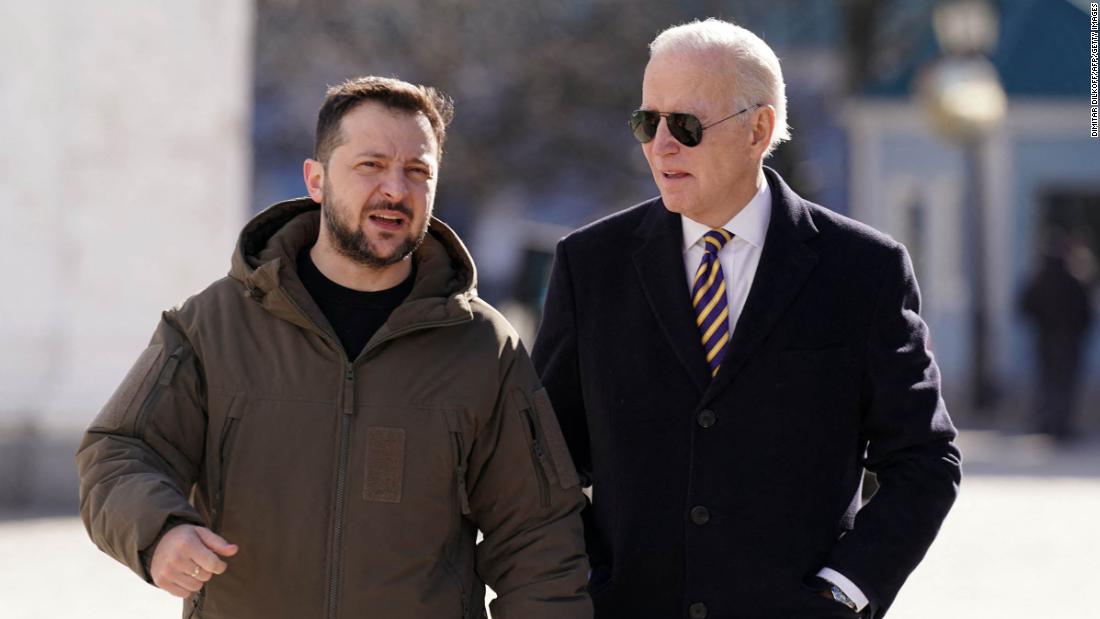 US President Joe Biden, right, walks next to Ukrainian President Volodymyr Zelensky as he arrives for a visit in Kyiv, Ukraine, on Monday, February 20.