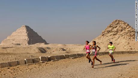 Young runners take part in the Saqqara Pyramid Race at Egypt&#39;s Saqqara necropolis, some 30km (19 miles) south of Cairo, on February 17, 2023. 