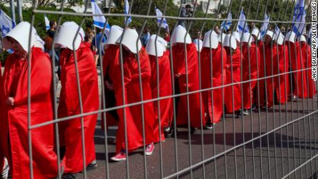 Demonstrators dressed as handmaids from the dystopian book &quot;The Handmaid&#39;s Tale&quot; protest in Tel Aviv on Monday. 