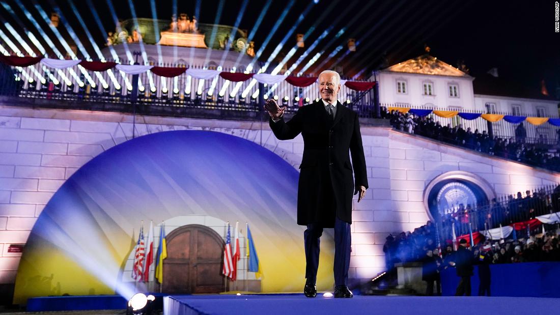 Biden walks out to deliver a speech in Warsaw on Tuesday. &quot;One year ago, the world was bracing for the fall of Kyiv,&quot; he said. &quot;Well, I&#39;ve just come from a visit to Kyiv and I can report Kyiv stands strong. Kyiv stands proud, it stands tall and most important, it stands free.&quot;