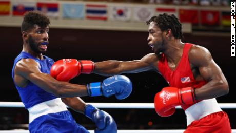 Andy Cruz of Team Cuba dodges a punch from Keyshawn Davis of Team USA during the men&#39;s lightweight final at the Tokyo 2020 Olympics.