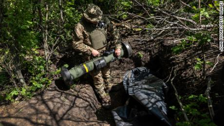 A Ukrainian Army soldier places a US-made Javelin missile in a fighting position on the frontline on May 20, 2022, in Kharkiv Oblast, Ukraine.