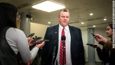 WASHINGTON, DC - FEBRUARY 09: Sen. Jon Tester (D-MT) speaks to reporters in the Senate Subway on his way to a closed-door briefing for Senators about the Chinese spy balloon at the U.S. Capitol on Thursday, Feb. 9, 2023 in Washington, DC.  (Kent Nishimura / Los Angeles Times via Getty Images)