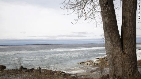 The Lake Champlain shoreline on February 16. The lake near the access area is covered with ice, but officials are warning anglers to stay off the lake because unseasonably warm temperatures have made it unsafe. 