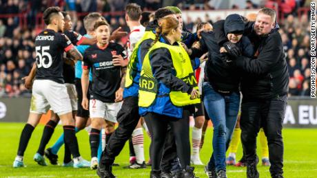 The pitch invader was eventually taken away by the stewards.