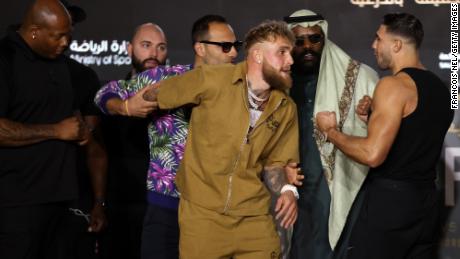 Paul and Fury clash during their press conference. 