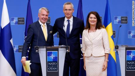 NATO Secretary General Jens Stoltenberg meets Swedish and Finnish foreign ministers in July 2022. One NATO diplomat told CNN it&#39;s likely that Finland breaks from Sweden and goes for membership alone.