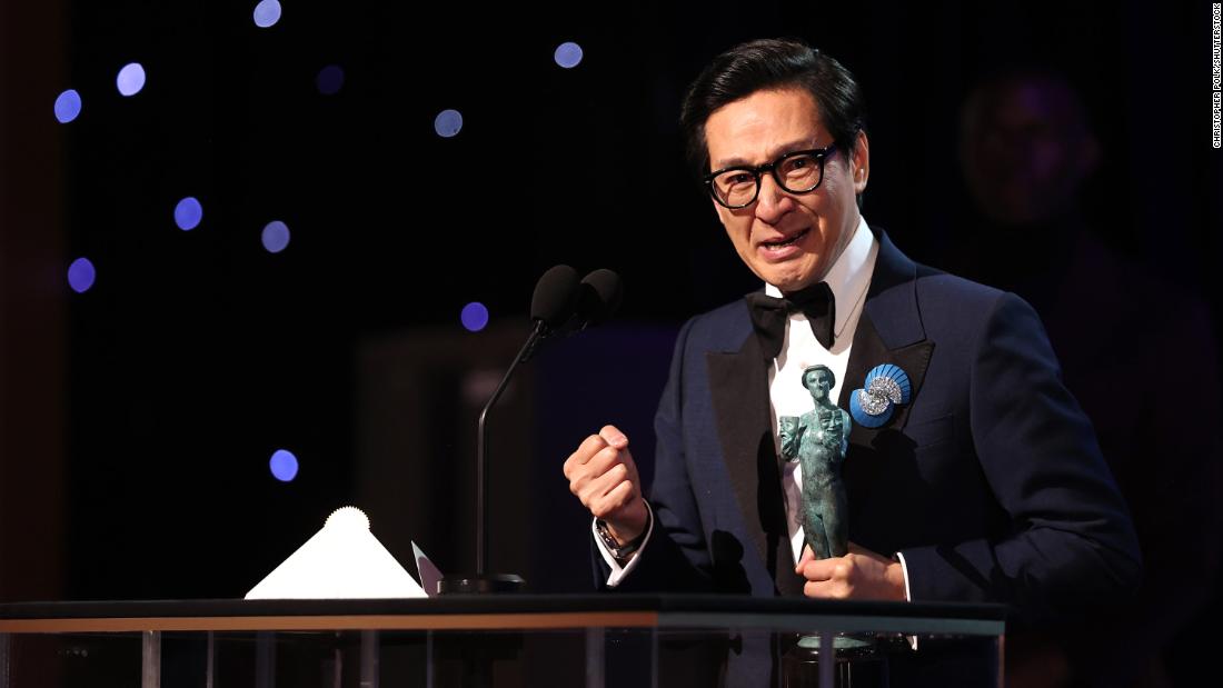 Ke Huy Quan accepts the supporting male actor in a film award for &quot;Everything Everywhere All At Once.&quot; 