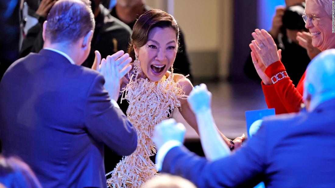 Michelle Yeoh reacts to winning the leading female actor in a film award for &quot;Everything Everywhere All at Once.&quot;