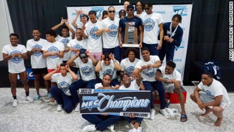 Howard University&#39;s men&#39;s swimming and diving team celebrates winning the Northeast Conference Championship.