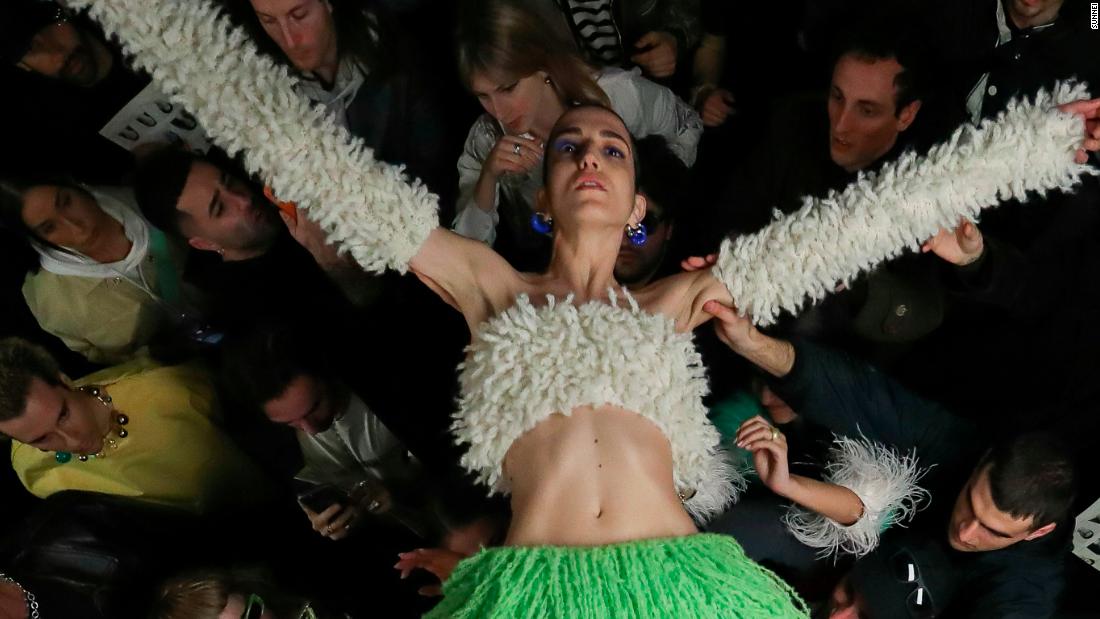 Milan Fashion Week Highlights: Crowd-surfing models, a condom mountain and 80s club culture