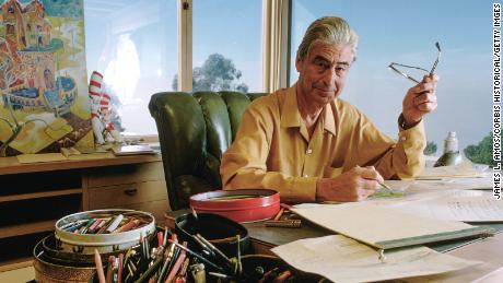 Theodor Seuss Geisel, better known as author Dr. Seuss, drawing at his desk in  1969.