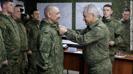 Russia&#39;s Defence Minister Sergei Shoigu awards service members during what the defence ministry said to be an inspection of a forward command post of Russian armed forces deployed in Ukraine, at an unknown location in the course of Russia-Ukraine conflict, in this handout image published March 4, 2023.