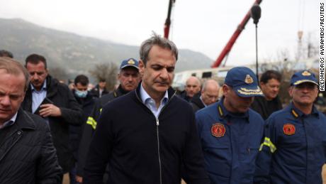 Greek Prime Minister Kyriakos Mitsotakis visits the site of a crash, where two trains collided. 