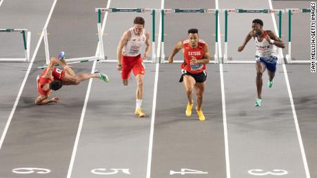 Enrique Llopis suffered a nasty fall in the mens&#39; 60m hurdles final at the European Athletics Indoor Championships.