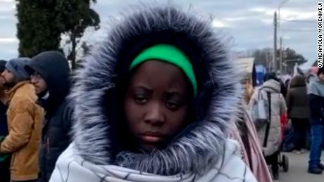 Oyindamola Morenikeji pictured at the Romanian border after crossing from Ukraine in March 2022