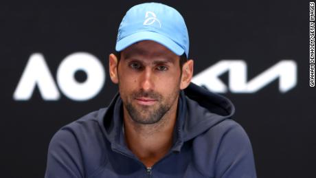 Djokovic talks to reporters at the Australian Open earlier this year. 