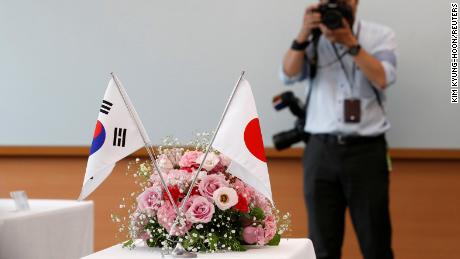 National flags of South Korea and Japan are displayed during a meeting between representatives from both countries in Tokyo, Japan, July 31, 2019.  