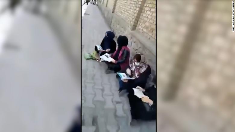 Afghan women protest outside Kabul University as male students return to class