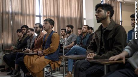 Male students attend a computer science class after universities reopened in Kabul, Afghanistan on March 6, 2023. 