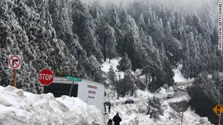 A series of winter storms dropped more than 100 inches of snow in the San Bernardino Mountains in Southern California on March 6, 2023, in Crestline, California.