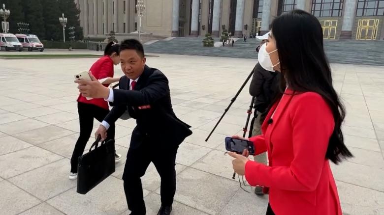 Member of Chinese parliament runs from CNN's questions