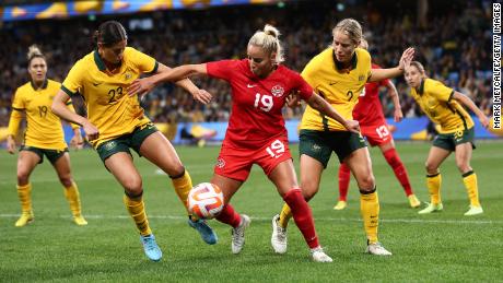 Canadian Adriana Leon is challenged by Kyra Cooney-Cross and Courtney Nevin of the Matildas during the international friendly between Australia and Canada at the Allianz Stadium on September 06, 2022 in Sydney, Australia.