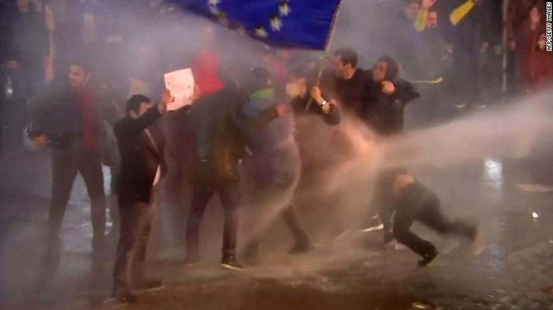 Video shows protesters clashing with police over Russian-style law