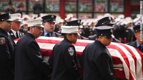 The casket for New York City fire department EMT Yadira Arroyo was brought into St. Nicholas of Tolentine R.C. Church in the Bronx on March 25, 2017, in New York City.