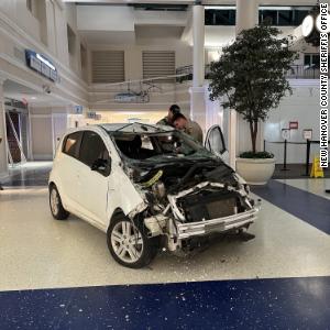 Car drives onto tarmac and crashes into terminal at North Carolina airport, deputies say