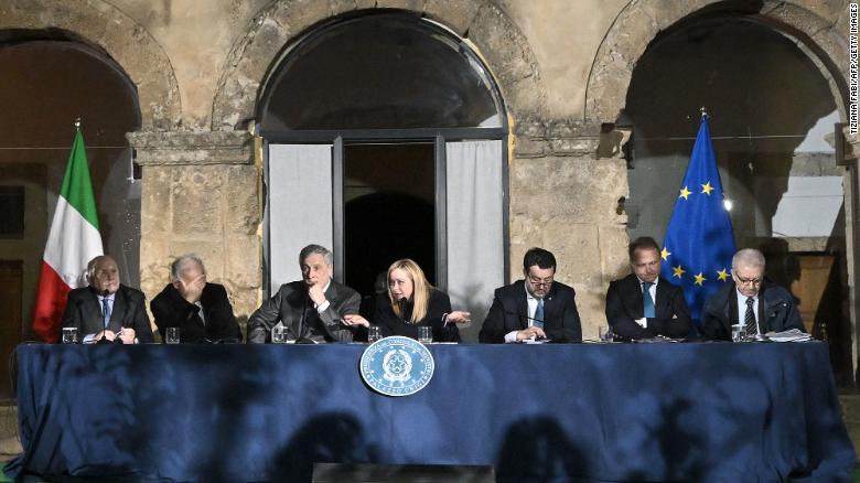 Italian lawmakers including Prime Minister Giorgia Meloni (center), pictured on March 9, 2023, are set to introduce new legislation targeting migrants who do not qualify for refugee status.