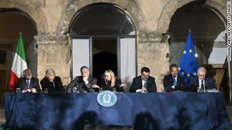 Italian lawmakers including Prime Minister Giorgia Meloni (center), pictured on March 9, 2023, are set to introduce new legislation targeting migrants who do not qualify for refugee status.