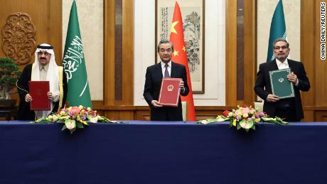 Wang Yi, China&#39;s top diplomat, with Secretary of Iran&#39;s Supreme National Security Council Ali Shamkhani and national security adviser of Saudi Arabia Musaad bin Mohammed Al Aiban in Beijing on March 10, 2023. 