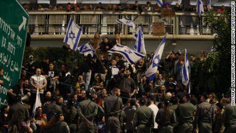 Israelis take part in a rally in Tel Aviv on Saturday to protest major changes to the country&#39;s judicial system.