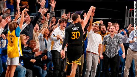 Steph Curry celebrates during the game against the Milwaukee Bucks.