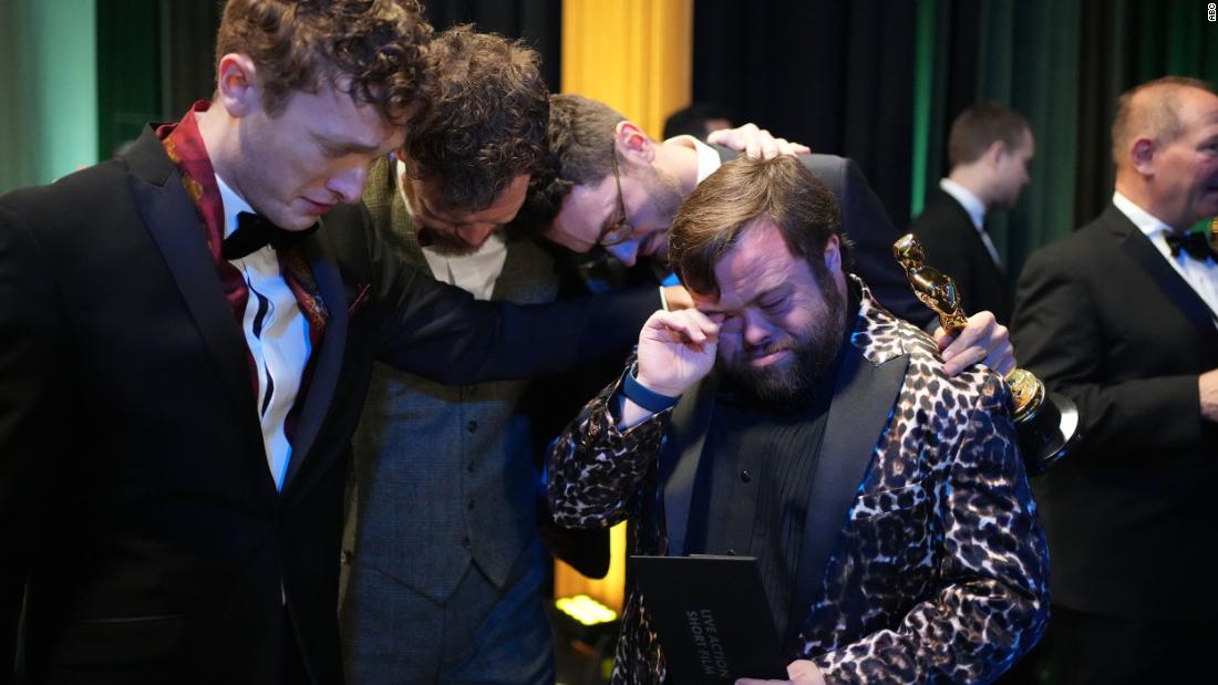 Ross White, Seamus O&#39;Hara, Tom Berkeley and James Martin share an emotional moment backstage after &quot;The Irish Goodbye&quot; won the Oscar for best live action short film. Martin, right, received an &lt;a href=&quot;https://www.cnn.com/entertainment/live-news/oscars-2023/h_c29518f5916f2f49ab1837b26752a0a4&quot; target=&quot;_blank&quot;&gt;unexpected surprise&lt;/a&gt; during the acceptance speech. His co-stars told the audience that they wanted to sing him &quot;Happy Birthday,&quot; and they did. The audience sang along.