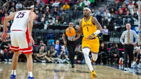 Arizona State guard Luther Muhammad brings the ball up court during the NCAA Pac 12 men&#39;s basketball tournament semifinals against the Arizona Wildcats.