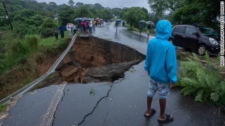 A general view of a collapsed road caused by flooding waters due to heavy rains caused by Tropical Cyclone Freddy in Blantyre, Malawi, on Monday.