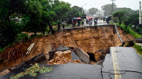 A road connecting the two cities of Blantyre and Lilongwe is seen damaged following heavy rains caused by Tropical Cyclone Freddy in Blantyre, Malawi Tuesday, March 14 2023. The unrelenting cyclone that is currently battering southern Africa has killed at more than 50 people in Malawi and Mozambique since it struck the continent for a second time on Saturday night, authorities in both countries have confirmed. (AP Photo/Thoko Chikondi)