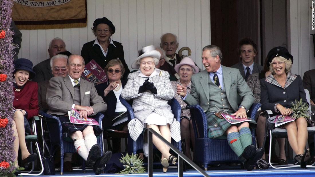Charles and Camilla join Queen Elizabeth II and Prince Philip as they watch a tug-of-war competition in Braemar, Scotland, in September 2006.