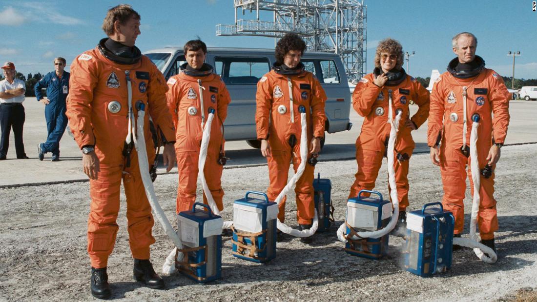The astronaut crew members for NASA&#39;s STS-34 mission prepare to participate in emergency egress training at the shuttle landing facility while wearing their partially pressurized flight suits with attached cooling packs. This photo from September 13, 1989, features, from left, astronauts Michael J. McCulley, pilot; mission specialists Franklin R. Chang-Diaz, Ellen S. Baker and Shannon W. Lucid; and Donald E. Williams, mission commander.
