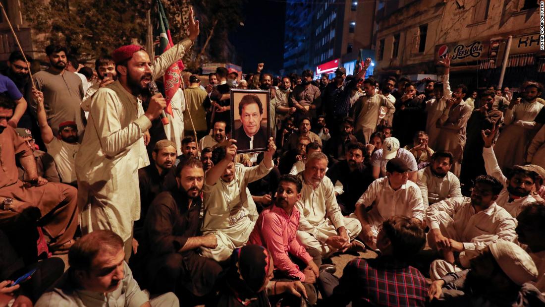 Imran Khan greets supporters outside home after Pakistan arrest operation ends in chaos