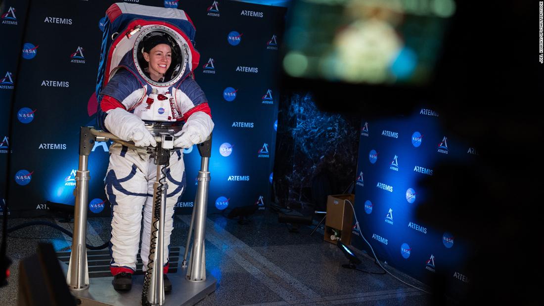 Kristine Davis, a spacesuit engineer at NASA&#39;s Johnson Space Center, wears a ground prototype of NASA&#39;s Exploration Extravehicular Mobility Unit (xEMU) during a demonstration on October 15, 2019, at NASA Headquarters in Washington. The xEMU was designed to improve on the suits previously worn on the moon during the Apollo era and those currently in use for spacewalks outside the International Space Station. 