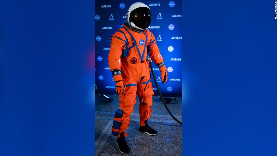 Dustin Gohmert, Orion crew survival systems project manager at NASA&#39;s Johnson Space Center, poses for a portrait while wearing the Orion Crew Survival System (OCSS) suit on October 15, 2019, at NASA Headquarters in Washington, DC. The suit is designed for a custom fit and incorporates safety technology and mobility features that will help protect astronauts while they&#39;re aboard the Orion spacecraft.