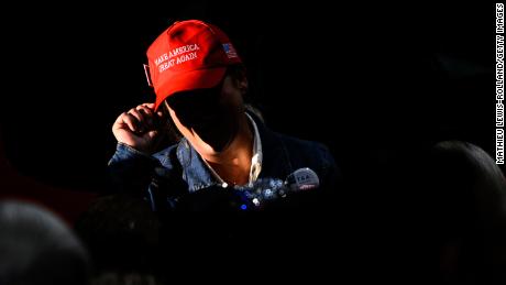 A supporter wears a &quot;Make America Great Again&quot; hat at a rally for Oregon gubernatorial candidate Christine Drazan on October 18, 2022, in Aurora, Oregon.