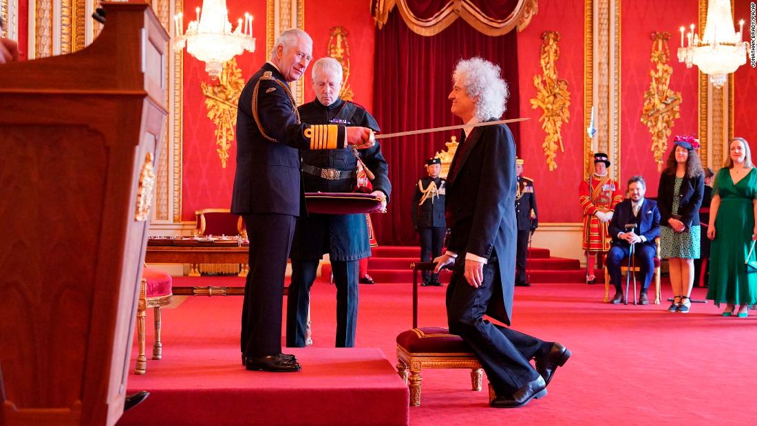 Brian May, lead guitarist for Queen, receives a knighthood from King Charles III