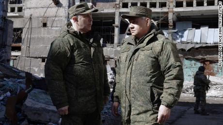 Russia&#39;s Defense Minister Sergei Shoigu, right, is seen at a purported forward command post of Russian armed forces deployed in Ukraine at an unknown location in a handout image published March 4.