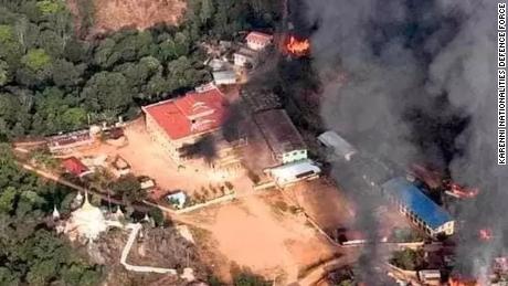 The monastery and homes in Nan Neint village burn after a raid by Myanmar junta troops in Shan state.