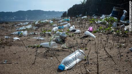 Beach polluted by discarded plastic and wood debris from the sea in New Taipei, Taiwan on 17/11/2022.