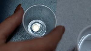 A patient prepares to take mifepristone, the first pill given in a medical abortion, at Women&#39;s Reproductive Clinic of New Mexico in Santa Teresa, U.S., January 13, 2023. 